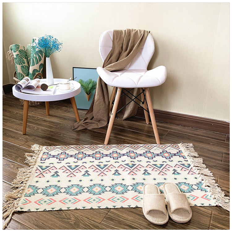Woven tassel carpet placed in a cozy living room with neutral furniture and boho accents