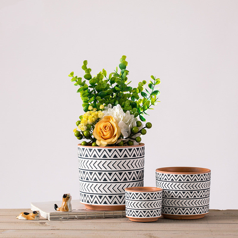 Nordic style ceramic geometric flower pots for modern home décor.