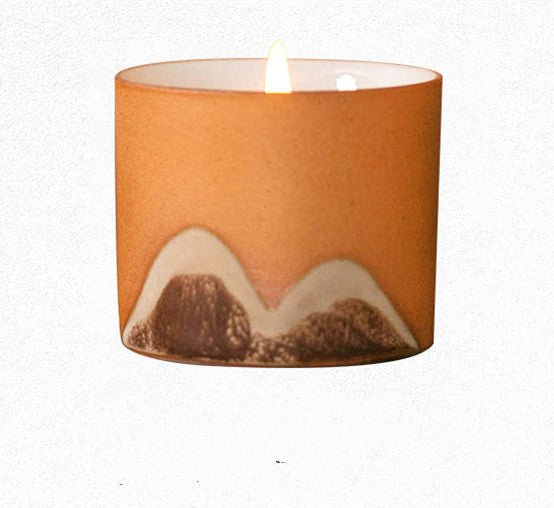 Scenic candle décor