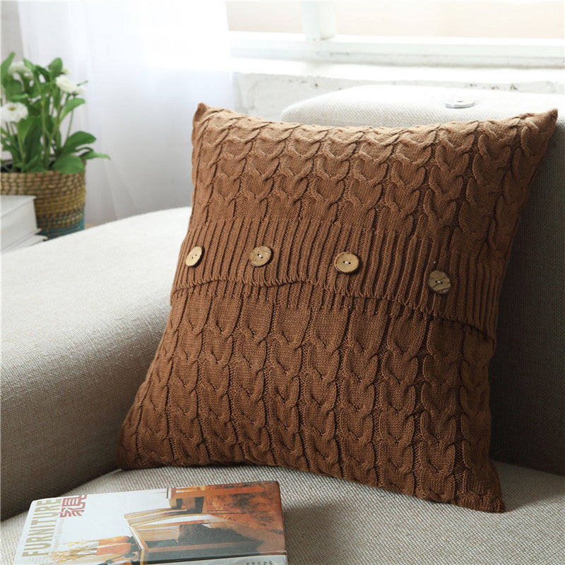 Woven Nordic minimalist pillowcase on a modern sofa in a neutral living room