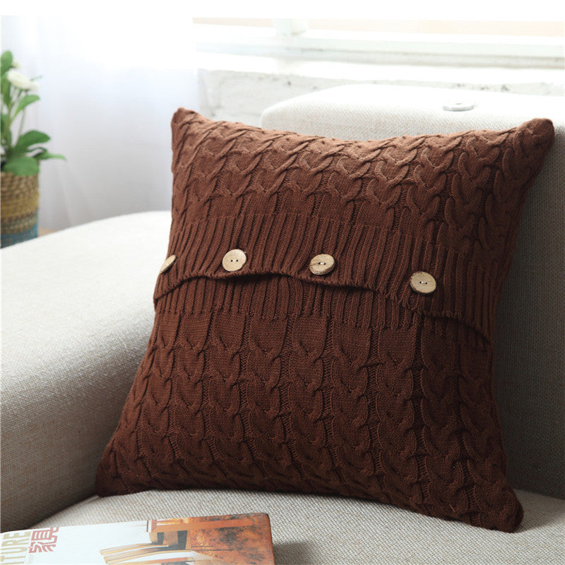 Woven Nordic minimalist pillowcase on a modern sofa in a neutral living room