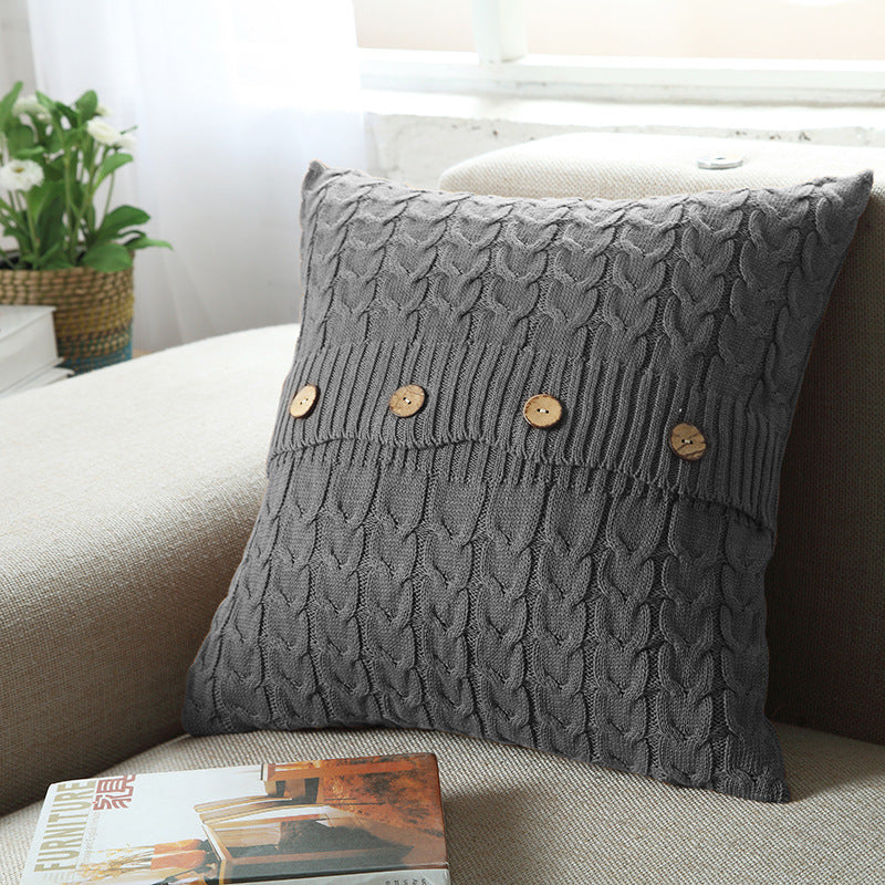 Woven Nordic minimalist pillowcase on a modern sofa in a neutral living room