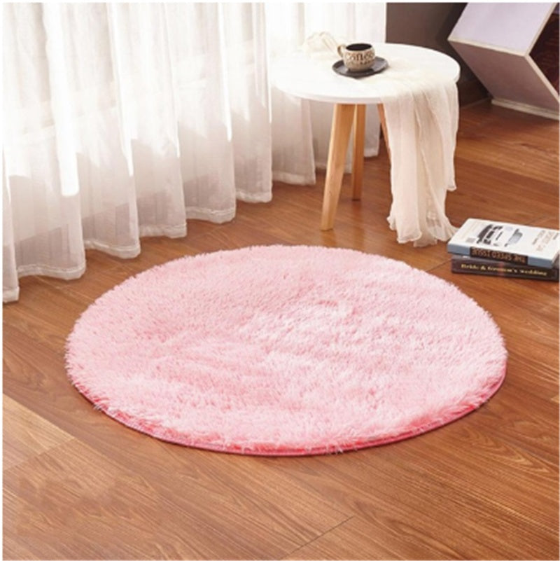 Soft carpet floor mat placed in a cozy living room extending into a modern bedroom setting
