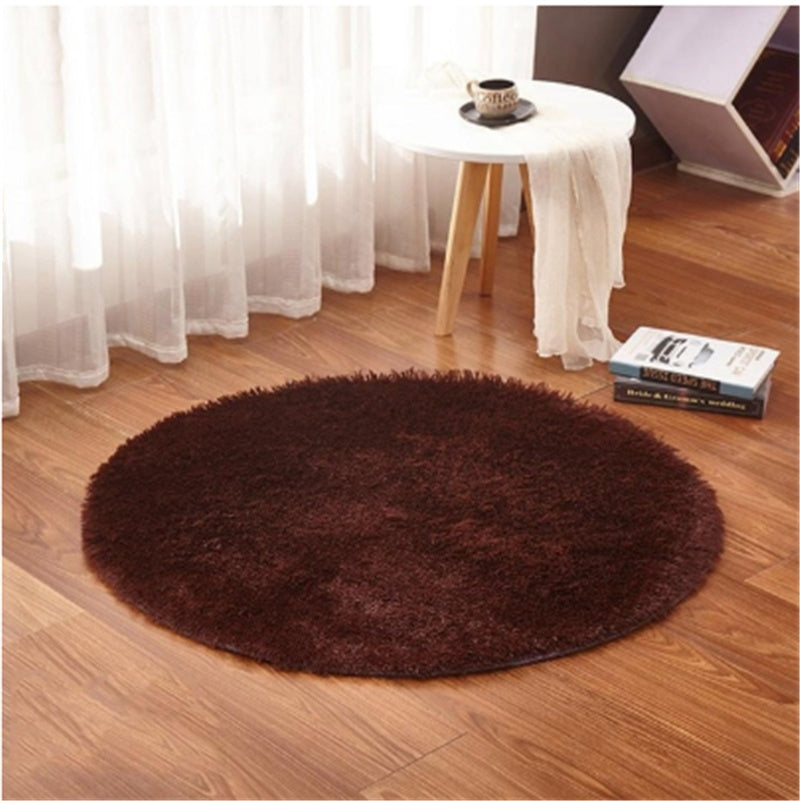 Soft carpet floor mat placed in a cozy living room extending into a modern bedroom setting