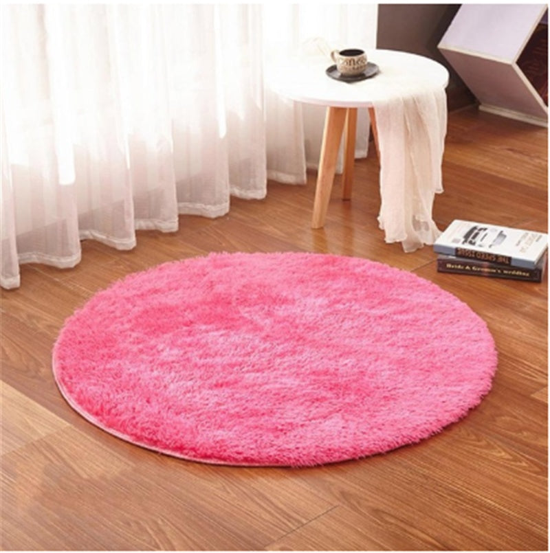 Soft carpet floor mat placed in a cozy living room extending into a modern bedroom setting