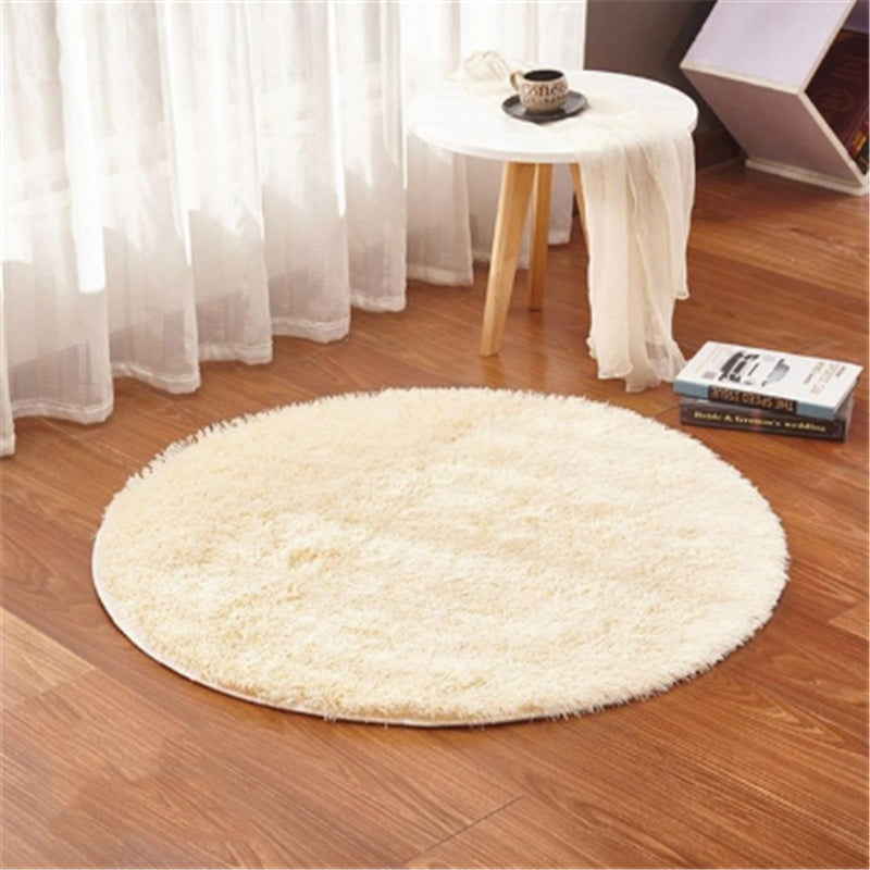 Soft carpet floor mat placed in a cozy living room extending into a modern bedroom setting