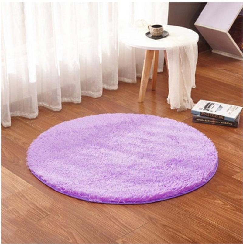 Soft carpet floor mat placed in a cozy living room extending into a modern bedroom setting