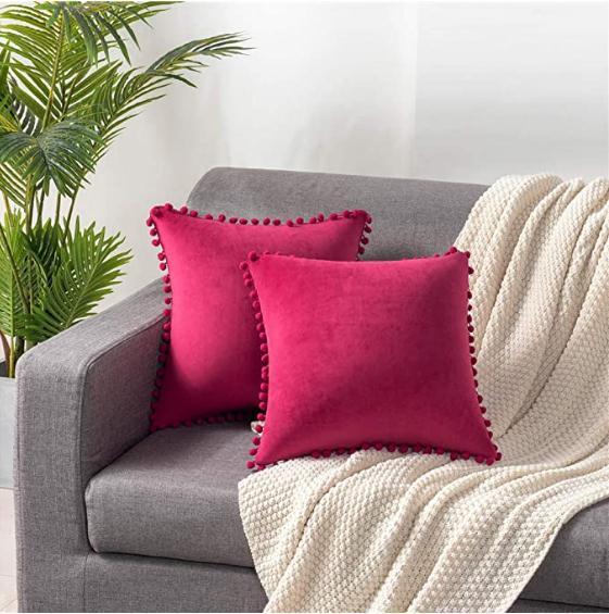Wind velvet solid color cushion cover placed on an office chair in a stylish workspace