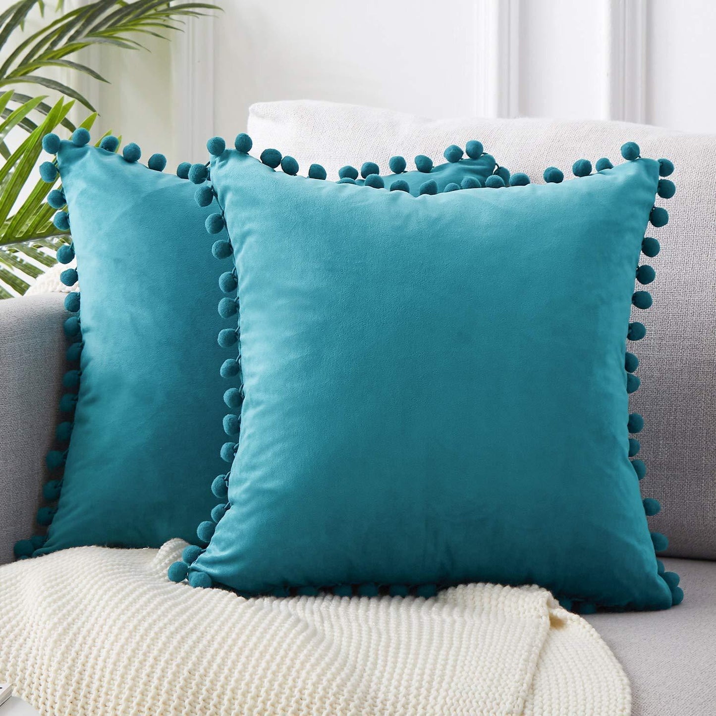 Wind velvet solid color cushion cover placed on an office chair in a stylish workspace