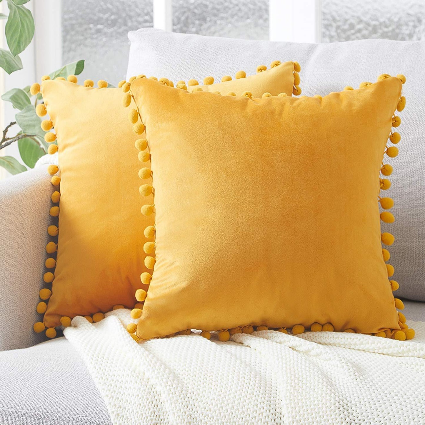 Wind velvet solid color cushion cover placed on an office chair in a stylish workspace