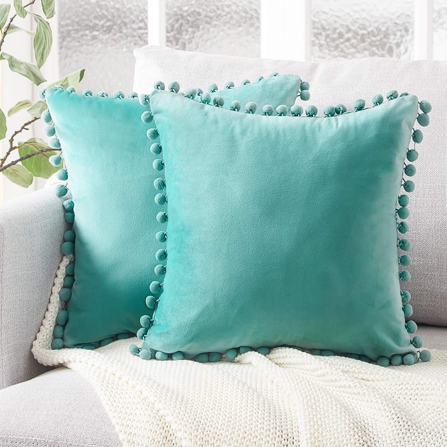 Wind velvet solid color cushion cover placed on an office chair in a stylish workspace