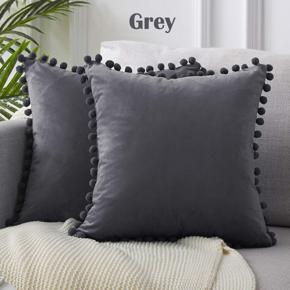 Wind velvet solid color cushion cover placed on an office chair in a stylish workspace