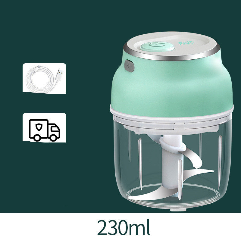Portable electric mini garlic chopper and food grinder for quick cooking.