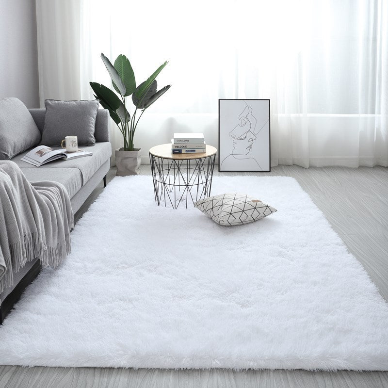 Nordic fluffy rectangle rug in white placed in a cozy living room with soft lighting
