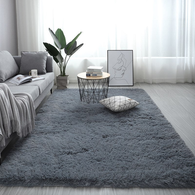 Nordic fluffy rectangle rug in white placed in a cozy living room with soft lighting