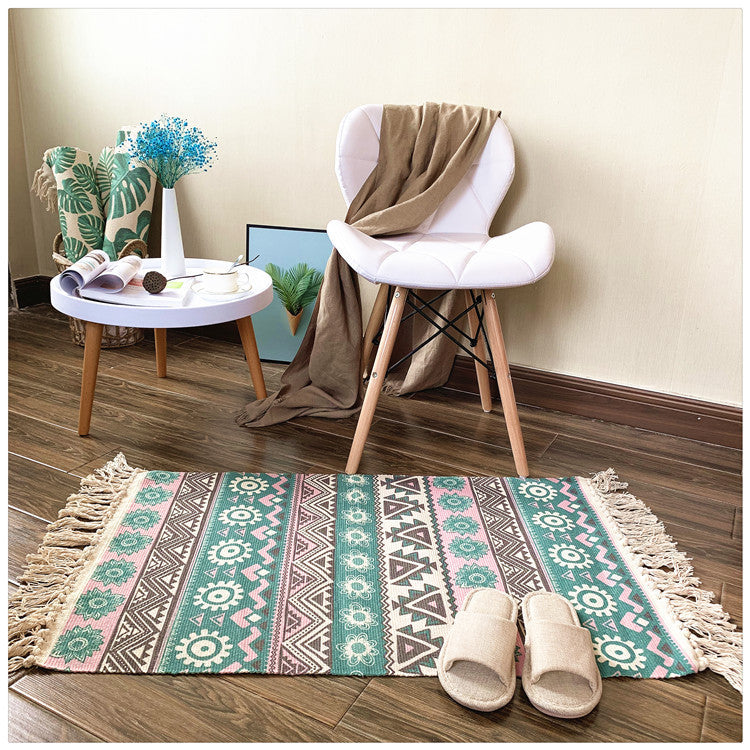 Woven tassel carpet placed in a cozy living room with neutral furniture and boho accents