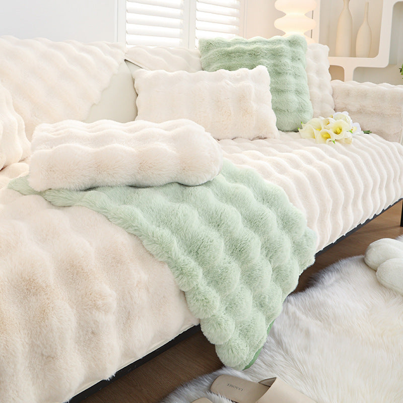 Rabbit plush sofa cushion with leather anti-skid design.