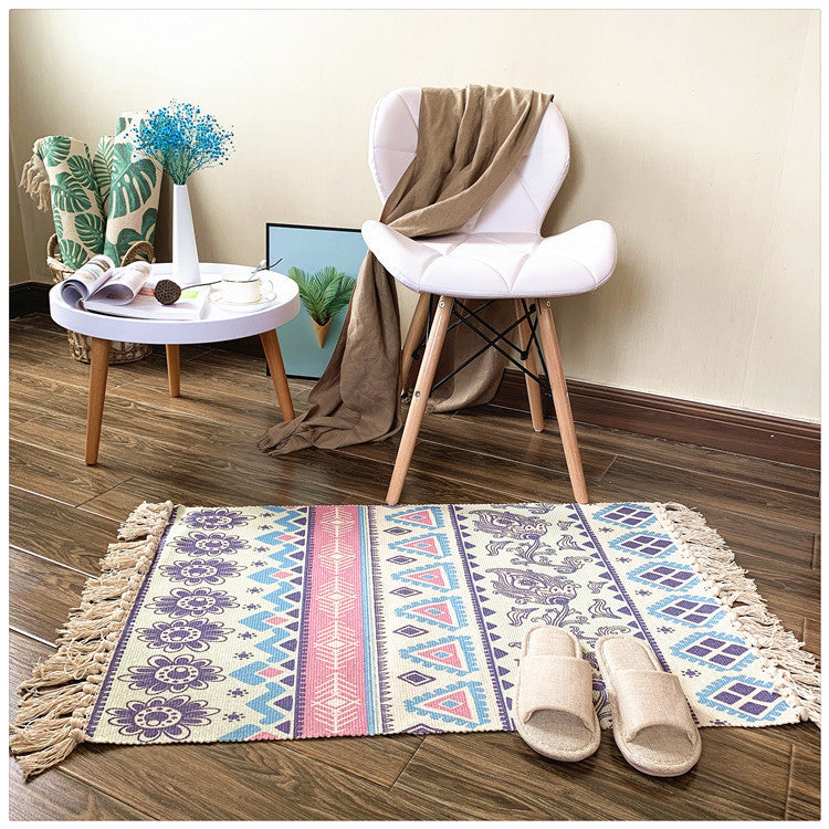 Woven tassel carpet placed in a cozy living room with neutral furniture and boho accents