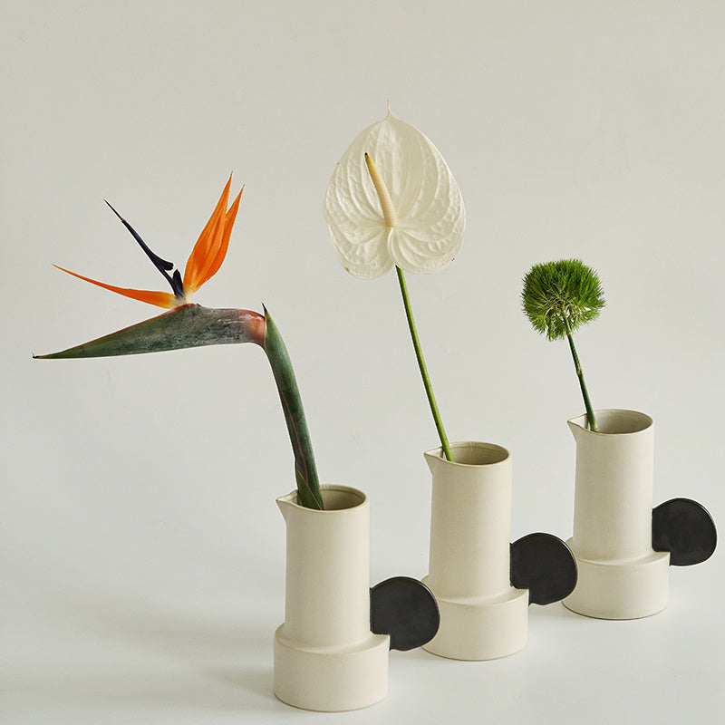 Modern medium ceramic vase for simple home décor styling.