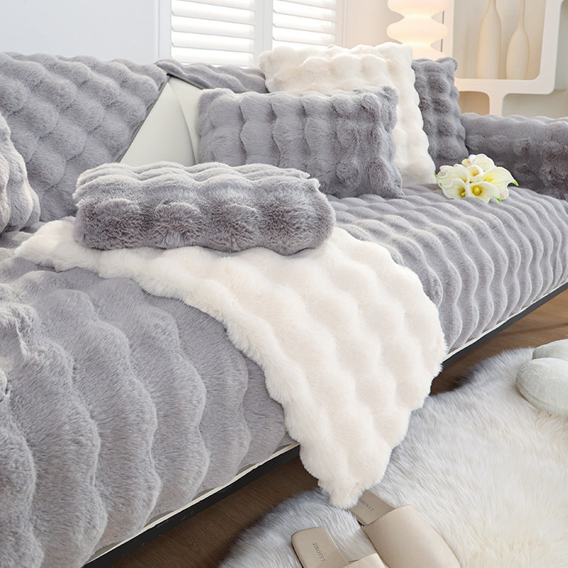 Rabbit plush sofa cushion with leather anti-skid design.