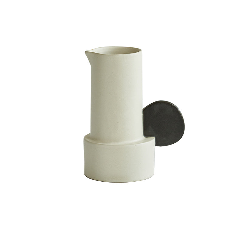 Modern medium ceramic vase for simple home décor styling.