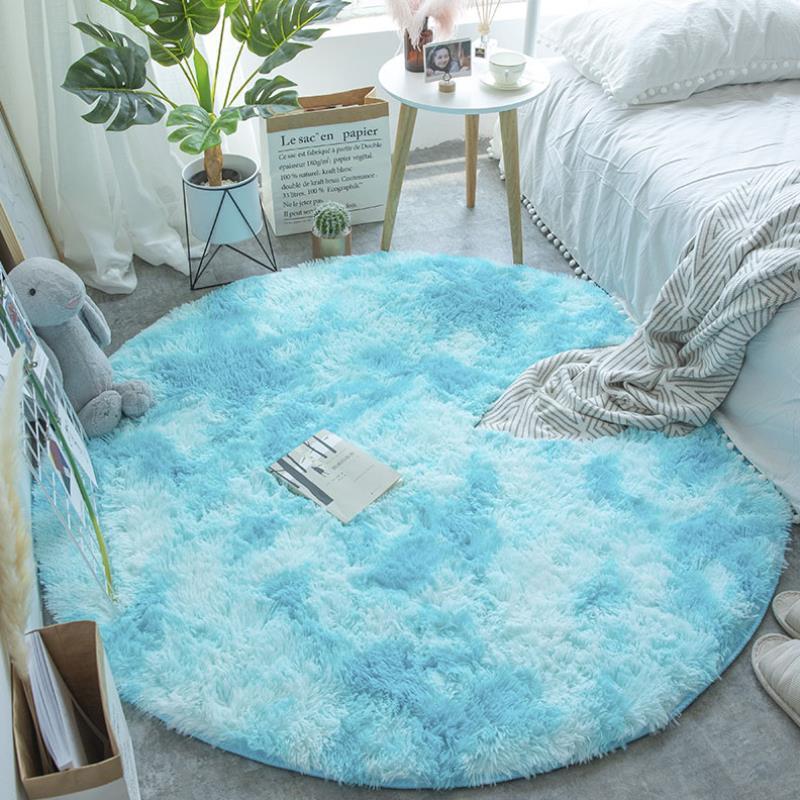 Nordic round silk wool carpet placed in a minimalist living room with natural light and cozy furniture
Nordic round silk wool carpet placed in a minimalist living room with natural light and cozy furniture