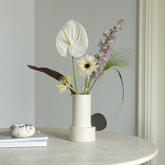 Modern medium ceramic vase for simple home décor styling.