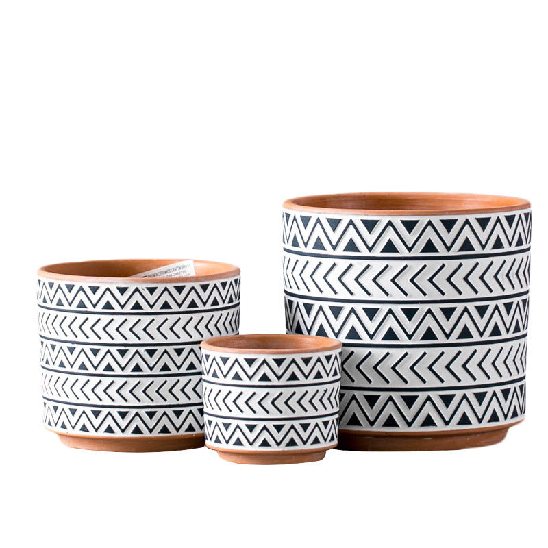 Nordic style ceramic geometric flower pots for modern home décor.
