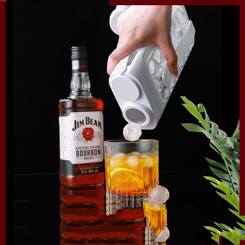 Portable ice ball kettle with quick release for summer drinks.