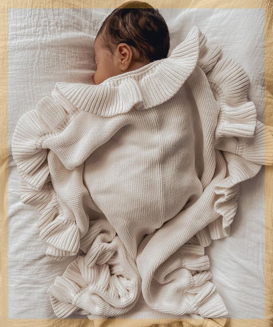 Newborn swaddle wrap
Ruffle baby blanket