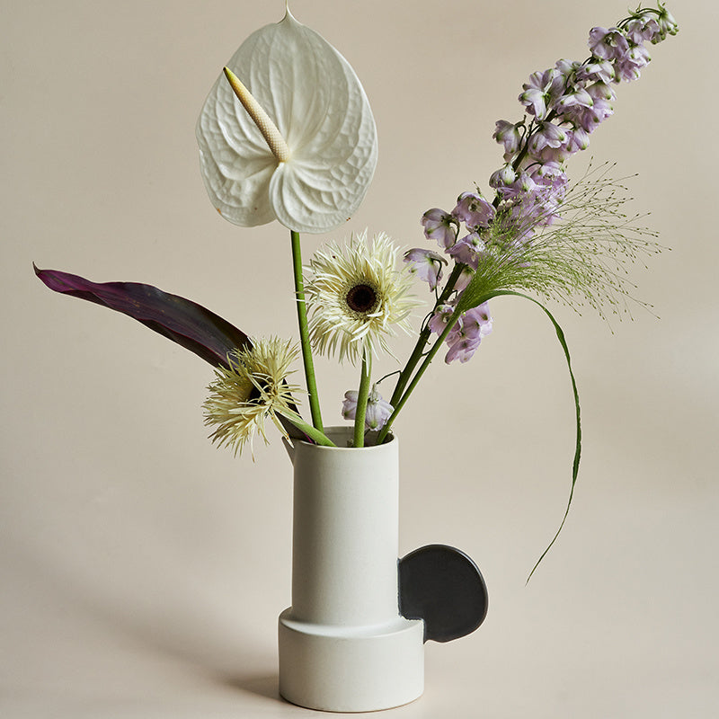 Modern medium ceramic vase for simple home décor styling.