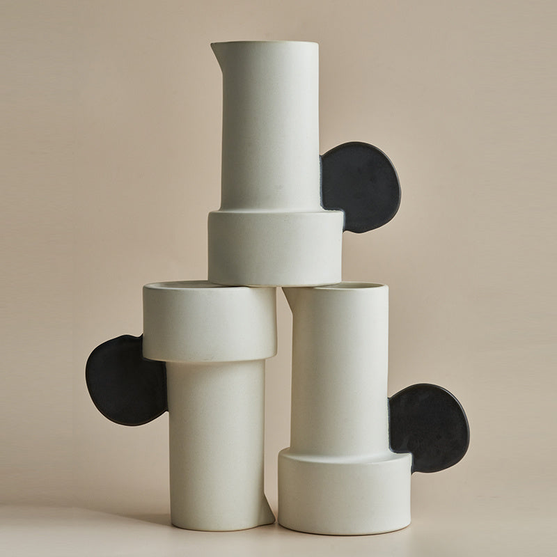 Modern medium ceramic vase for simple home décor styling.
