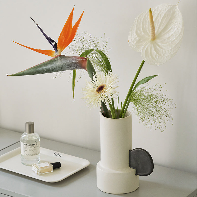 Modern medium ceramic vase for simple home décor styling.