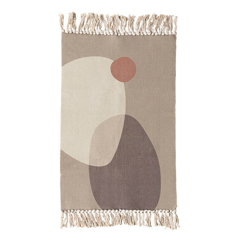 Small floor mat placed beside a living room sofa and coffee table in a modern, cozy space