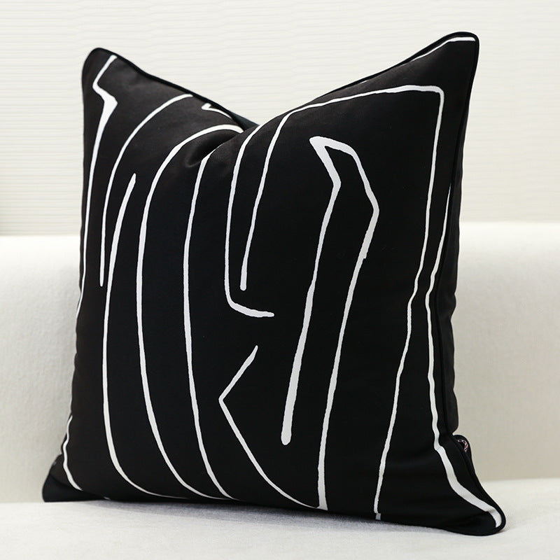 Nordic-style decorative cushion on a minimalist sofa with neutral tones

