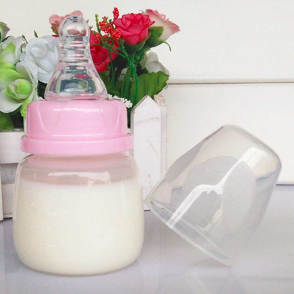 Infant nursing bottle

Baby bottle with nipple

