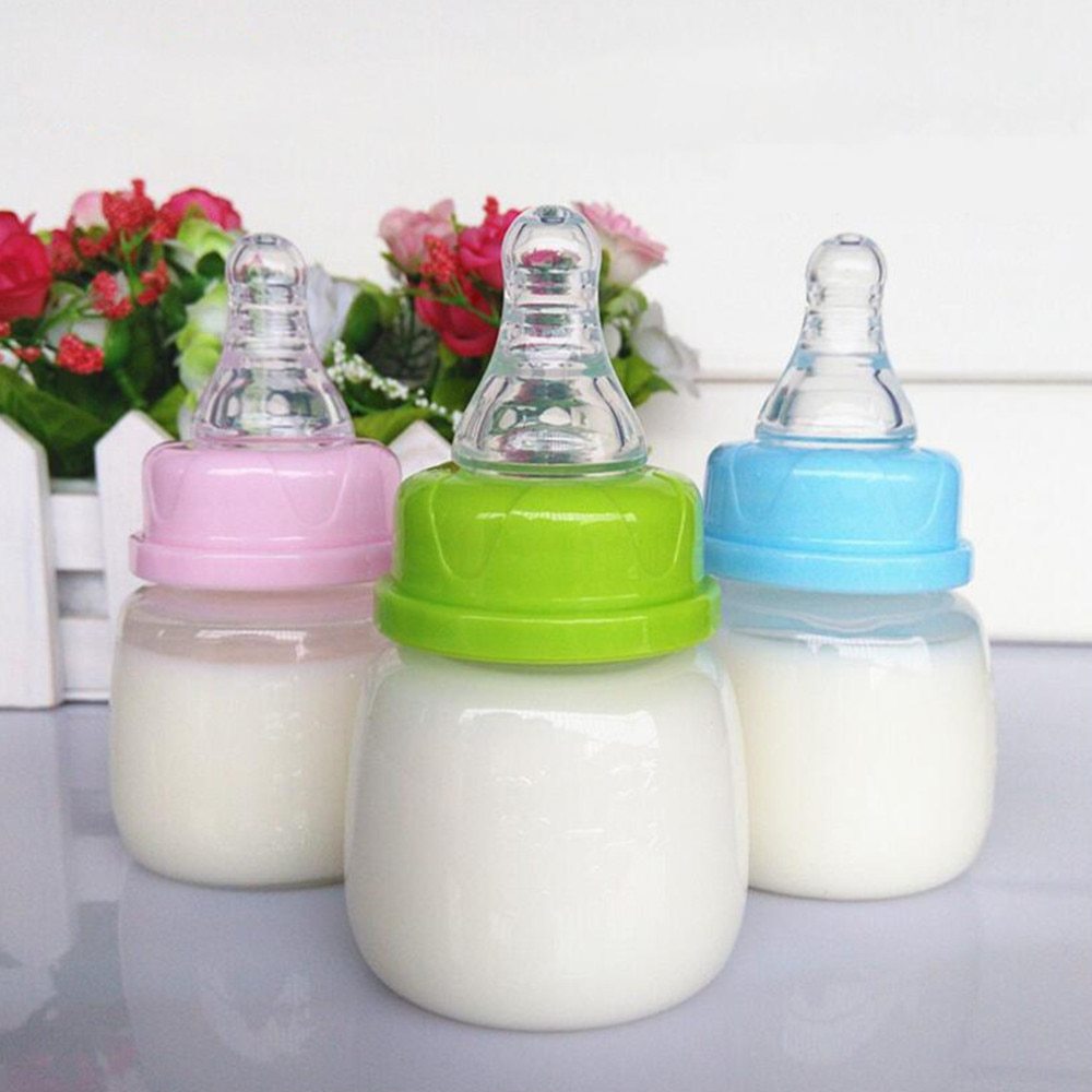 Infant nursing bottle

Baby bottle with nipple

