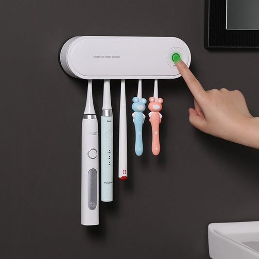 Toothbrush sanitizer holder