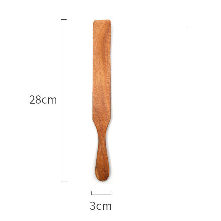 Handmade teak wood cooking spatula for salads and kitchen use.