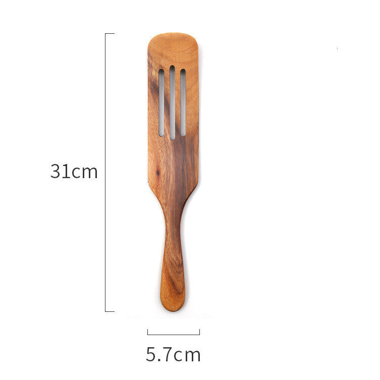 Handmade teak wood cooking spatula for salads and kitchen use.