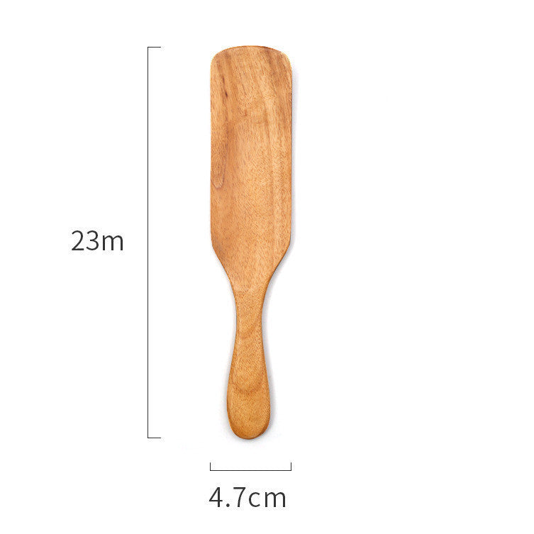 Handmade teak wood cooking spatula for salads and kitchen use.
