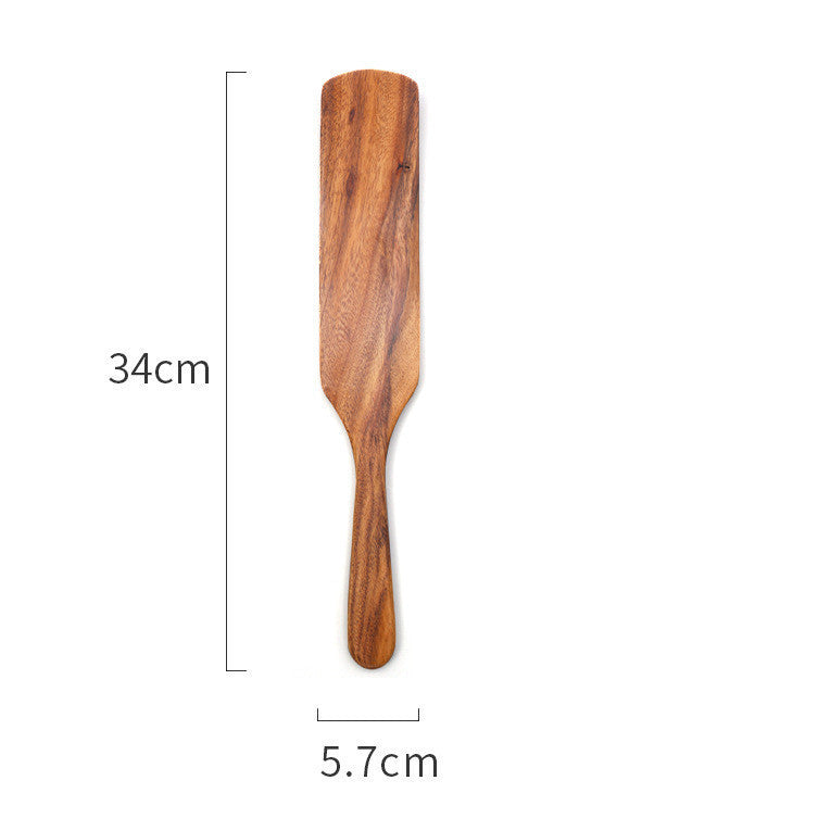 Handmade teak wood cooking spatula for salads and kitchen use.