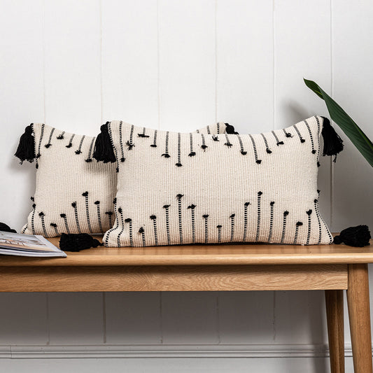 Bohemian Moroccan fringe pillowcase with ethnic patterns on a cozy sofa setting

