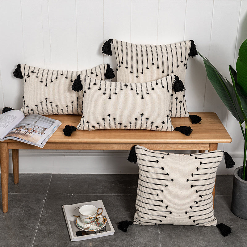 Bohemian Moroccan fringe pillowcase with ethnic patterns on a cozy sofa setting


