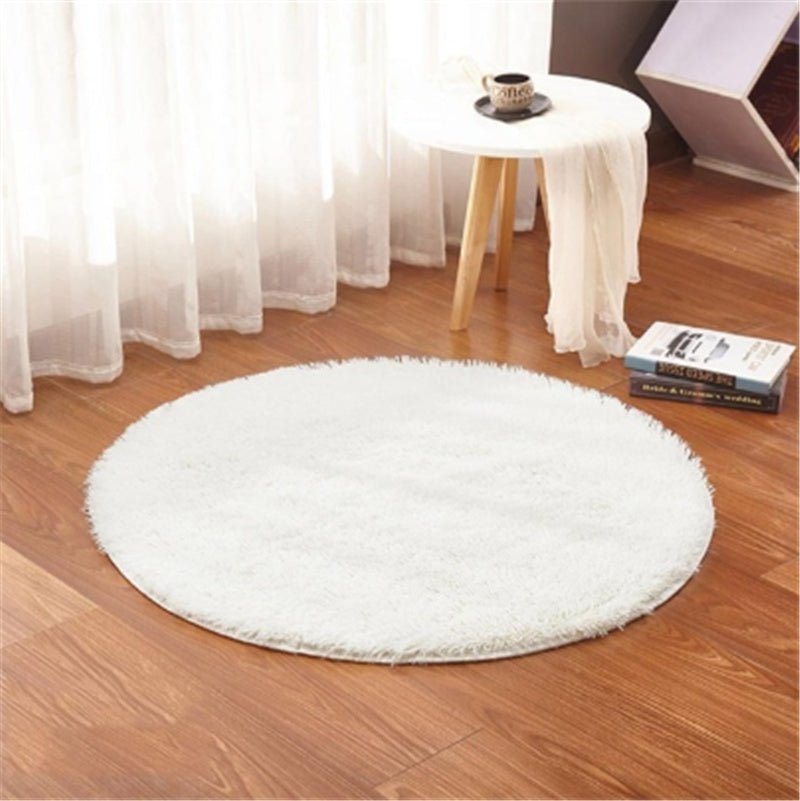 Soft carpet floor mat placed in a cozy living room extending into a modern bedroom setting

