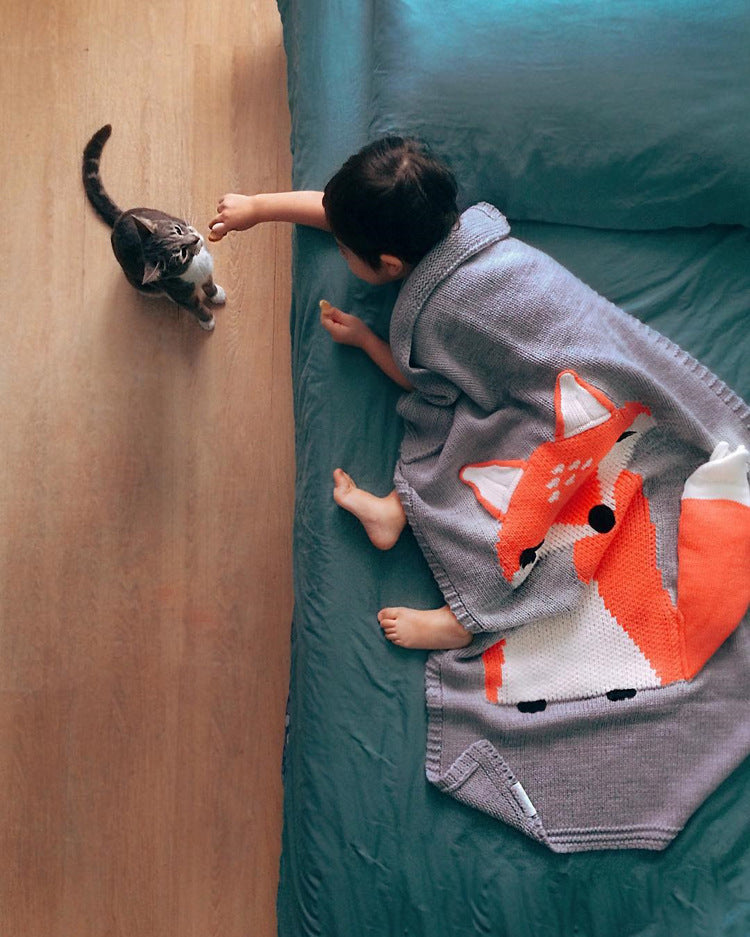 Knitted children’s blanket

Baby holding blanket