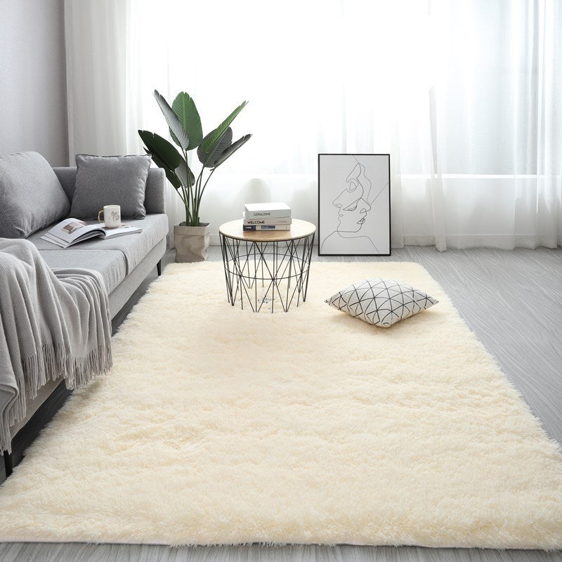 Nordic fluffy rectangle rug in white placed in a cozy living room with soft lighting


