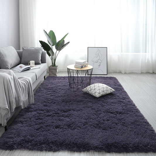 Nordic fluffy rectangle rug in white placed in a cozy living room with soft lighting

