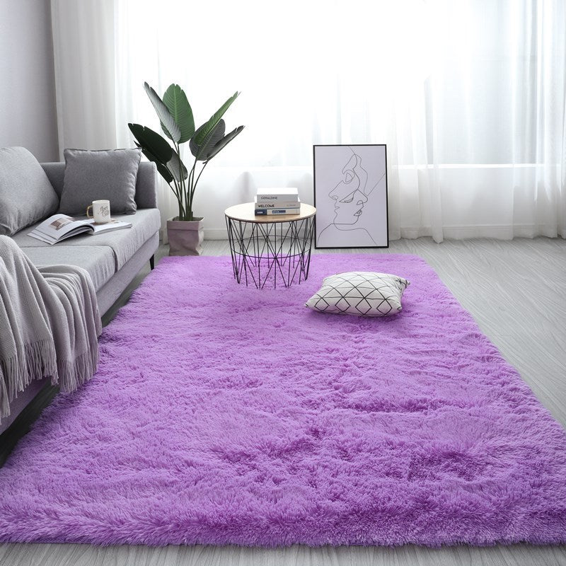 Nordic fluffy rectangle rug in white placed in a cozy living room with soft lighting


