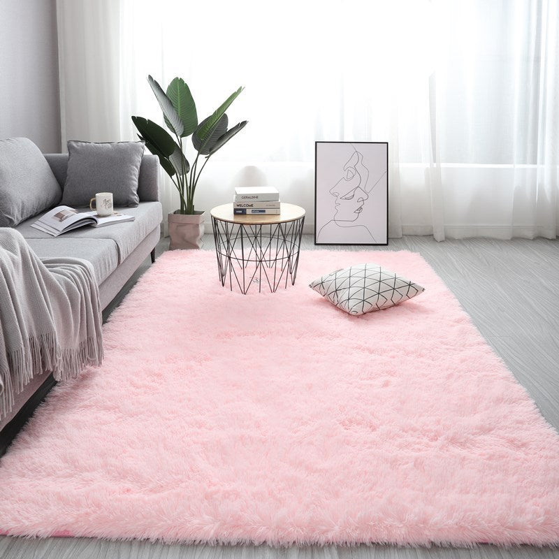 Nordic fluffy rectangle rug in white placed in a cozy living room with soft lighting

